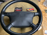 993 Steering wheel with airbag driver black NOTE HAZARDOUS ADDITIONAL SHIPPING CHARGES WILL BE REQUIRED FOR AIRBAG - 993.347.804.55