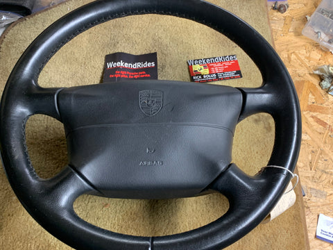 993 Steering wheel with airbag driver black NOTE HAZARDOUS ADDITIONAL SHIPPING CHARGES WILL BE REQUIRED FOR AIRBAG - 993.347.804.55