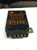 911 Turbo Alarm Hella Relay with bracket orange Hella Orange lettering

bracket 911.637.117.00 - 911.637.104.00
