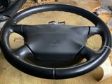 993 Steering wheel with airbag driver black NOTE HAZARDOUS ADDITIONAL SHIPPING CHARGES WILL BE REQUIRED FOR AIRBAG - 993.347.804.55