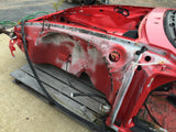 911 Front Clip Targa Red cut across floor, needs rust repoair under battery a arm mount damage on driver's rocker - cut across jack lifting tube 1988