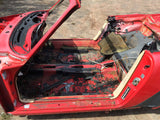 911 Body shell Cabrio Guards Red 1987 with wiring harness has fresh air - fuse box - master cylinder - a/c intact in smuggler's box.  CUT IN HALF.