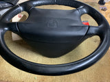 993 Steering wheel with airbag driver black NOTE HAZARDOUS ADDITIONAL SHIPPING CHARGES WILL BE REQUIRED FOR AIRBAG - 993.347.804.55