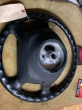 993 Steering wheel with airbag driver black NOTE HAZARDOUS ADDITIONAL SHIPPING CHARGES WILL BE REQUIRED FOR AIRBAG - 993.347.804.55