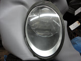 997 Headlight Left Driver has broken edge trim and back housing is cracked - 997.631.163.21