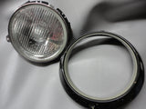 911 H4 Headlight Hella Flat with BLACK trim rings sold as a pair -