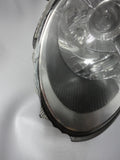 997 Headlight Left Driver has broken edge trim and back housing is cracked - 997.631.163.21