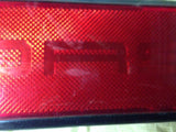 911 Rear Center Reflector 87-89 small chip bottom, light scratch - 911.633.123.02