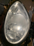 987 Cayman headlight xenon scuffed right passenger 2006