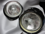 911 H4 Headlight Hella Flat with BLACK trim rings sold as a pair -